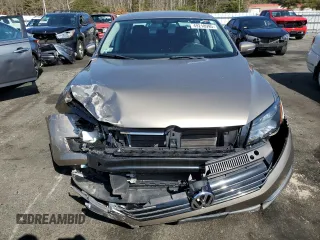 2015 Volkswagen Passat Limited Edition Edition z VIN 1VWAT7A33FC103074, wystawiony jako Copart lot #49218995 z przebiegiem 67 482 mil mil oraz Szkoda całkowita • Salvage title. Historia ofert i sprzedaży dostępna na DreamBid. Obrazek 5.