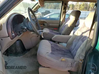 1998 GMC Safari z VIN 1GDDM19W5WB503552, wystawiony jako Copart lot #88247495 z przebiegiem 267 494 mil mil oraz Szkoda całkowita • Salvage title. Historia ofert i sprzedaży dostępna na DreamBid. Obrazek 7.