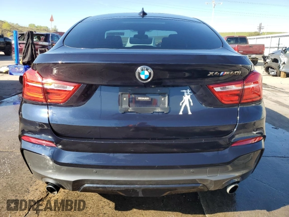 2018 BMW X4 M40i with VIN 5UXXW7C54J0Z44932, listed as a Copart auction lot 55973605 with 101,479 mi miles and Salvage title. Bid and sale history available at DreamBid. Image 6.