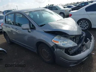 2012 Nissan Versa S with VIN 3N1BC1CPXCK229848, listed as a IAAI auction lot 41955230 with 194,702 mi miles. Bid and sale history available at carsss.com. Image 1.