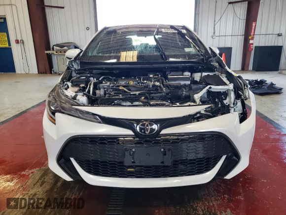 2022 Toyota Corolla Hatchback SE with VIN JTND4MBE4N3182793, listed as a Copart auction lot 69609184 with 21,813 mi miles and Salvage Title. Bid and sale history available at carsss.com. Image 5.