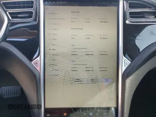 2013 Tesla Model S с VIN 5YJSA1DG7DFP11382, выставлен на аукционе Copart как лот 67097375 с пробегом 55 481 миль миль и Списание • Salvage title. История ставок и продаж доступна на DreamBid. Изображение 9.