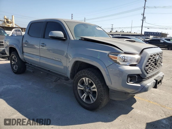 2020 Toyota Tacoma SR5 with VIN 3TMAZ5CN2LM137991, listed as a Copart auction lot 60317895 with 98,054 mi miles and Salvage title. Bid and sale history available at DreamBid. Image 4.