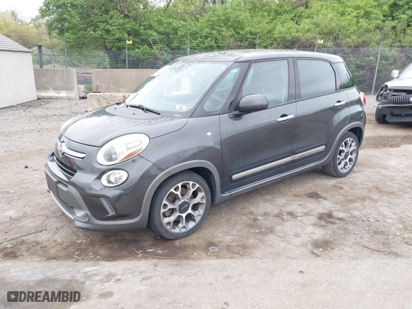 2014 FIAT 500L Trekking with VIN ZFBCFADHXEZ011031, listed as a IAAI auction lot 42094509 with 74,132 mi miles. Bid and sale history available at carsss.com. Image 2.