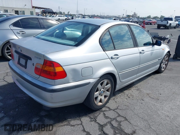 2002 BMW 3 Series 325i with VIN WBAET37492NG83135, listed as a IAAI auction lot 42028502 with 184,216 mi miles. Bid and sale history available at carsss.com. Image 4.