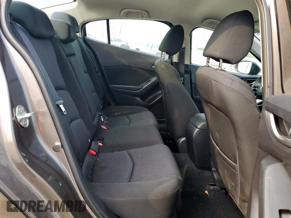 2014 Mazda 3 i Touring z VIN 3MZBM1V76EM112344, wystawiony jako Copart lot #57168785 z przebiegiem 122 826 mil mil oraz Szkoda całkowita • Salvage title. Historia ofert i sprzedaży dostępna na DreamBid. Obrazek 10.