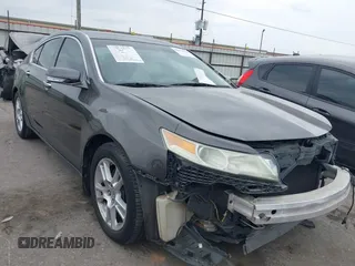 2009 Acura TL Technology z VIN 19UUA86519A023361, wystawiony jako IAAI lot #42024130 z przebiegiem 148 641 mil mil oraz . Historia ofert i sprzedaży dostępna na DreamBid. Obrazek 1.