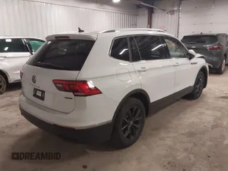 2024 Volkswagen Tiguan SE with VIN 3VVMB7AX6RM135219, listed as a IAAI auction lot 42311133 with 7,885 mi miles and . Bid and sale history available at DreamBid. Image 4.