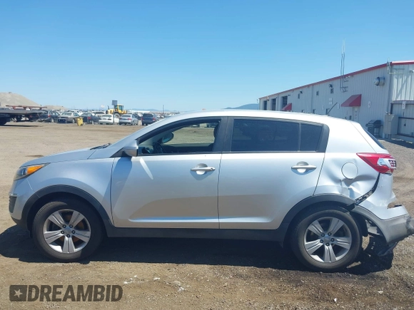 2013 Kia Sportage LX with VIN KNDPBCA24D7352828, listed as a IAAI auction lot 42685744 with 156,805 mi miles and . Bid and sale history available at DreamBid. Image 14.