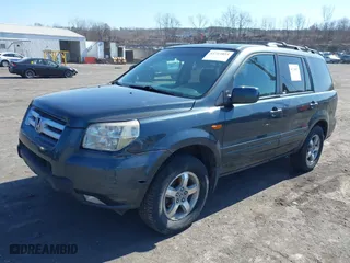 2006 Honda Pilot EX-L with RES with VIN 2HKYF18646H501940, listed as a IAAI auction lot 41714893 with 353,448 mi miles. Bid and sale history available at carsss.com. Image 2.