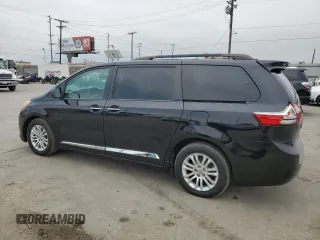 2015 Toyota Sienna XLE с VIN 5TDYK3DC6FS561960, выставлен на аукционе Copart как лот 59607355 с пробегом 110 593 миль миль и Списание • Salvage title. История ставок и продаж доступна на DreamBid. Изображение 2.