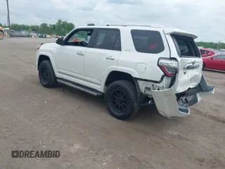 2014 Toyota 4Runner Limited with VIN JTEBU5JR4E5185764, listed as a IAAI auction lot 42117308 with 199,477 mi miles. Bid and sale history available at carsss.com. Image 3.