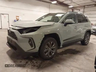 2023 Toyota RAV4 Hybrid XLE Premium z VIN 4T3B6RFV0PU118506, wystawiony jako IAAI lot #41972785 z przebiegiem 16 496 mil mil oraz . Historia ofert i sprzedaży dostępna na DreamBid. Obrazek 21.