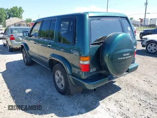 1999 Isuzu Trooper S with VIN JACDJ58X1X7917154, listed as a IAAI auction lot 42632311 with 200,023 mi miles and . Bid and sale history available at DreamBid. Image 3.