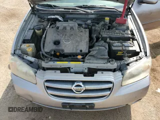 2002 Nissan Maxima GLE z VIN JN1DA31A62T000726, wystawiony jako Copart lot #71235864 z przebiegiem 219 647 mil mil oraz Szkoda całkowita • Salvage title. Historia ofert i sprzedaży dostępna na DreamBid. Obrazek 11.