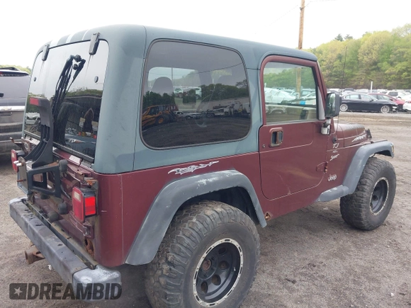 2001 Jeep Wrangler Sport with VIN 1J4FA49S31P301237, listed as a IAAI auction lot 42191884 with 154,627 mi miles and . Bid and sale history available at DreamBid. Image 4.
