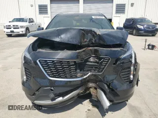 2021 Cadillac XT4 FWD Premium Luxury z VIN 1GYFZCR48MF002468, wystawiony jako Copart lot #50878955 z przebiegiem 76 034 mil mil oraz Szkoda całkowita • Salvage title. Historia ofert i sprzedaży dostępna na DreamBid. Obrazek 5.