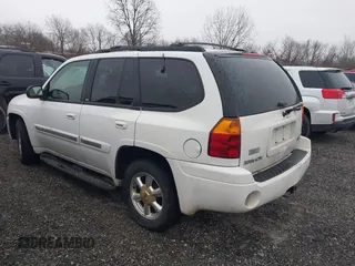 2003 GMC Envoy SLE with VIN 1GKDT13S732332171, listed as a IAAI auction lot 41520620 with 222,373 mi miles. Bid and sale history available at carsss.com. Image 3.