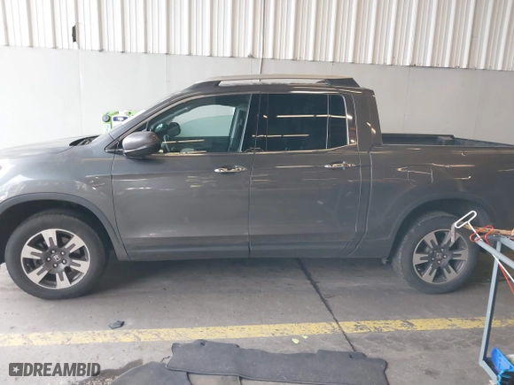 2017 Honda Ridgeline RTL-E with VIN 5FPYK3F73HB034764, listed as a IAAI auction lot 41146866 with 125,885 mi miles. Bid and sale history available at carsss.com. Image 14.