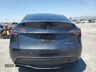 2024 Tesla Model Y Long Range with VIN 7SAYGDEE6RA226035, listed as a Copart auction lot 52539375 with 14,220 mi miles and Salvage title. Bid and sale history available at DreamBid. Image 6.