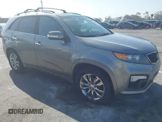 2012 Kia Sorento SX with VIN 5XYKW4A23CG241547, listed as a IAAI auction lot 41939973 with 135,986 mi miles. Bid and sale history available at carsss.com. Image 1.