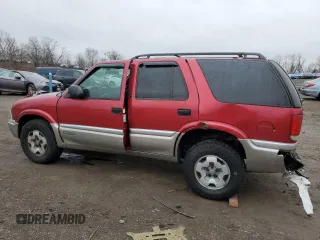 2001 GMC Jimmy SLE with VIN 1GKDT13W012159836, listed as a Copart auction lot 43290295 with 128,833 mi miles and Salvage Title. Bid and sale history available at carsss.com. Image 2.