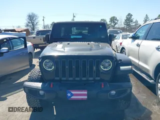 2019 Jeep Wrangler Unlimited Rubicon with VIN 1C4HJXFN1KW679028, listed as a IAAI auction lot 41654887 with 32,247 mi miles and . Bid and sale history available at DreamBid. Image 12.