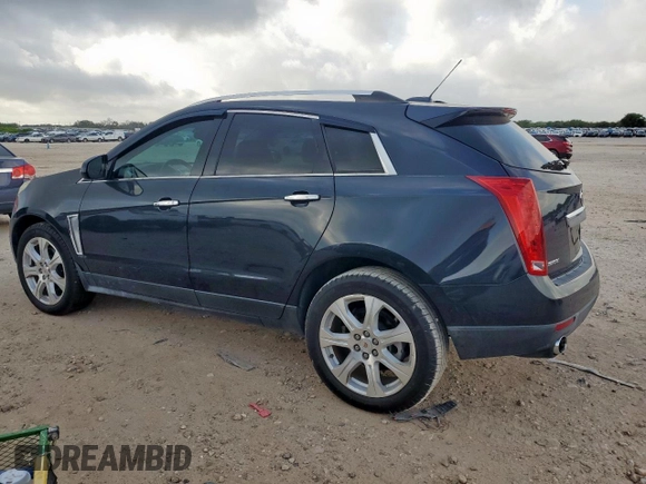 2016 Cadillac SRX Performance Collection with VIN 3GYFNCE32GS507625, listed as a Copart auction lot 61575625 with 47,427 mi miles and Salvage title. Bid and sale history available at DreamBid. Image 2.