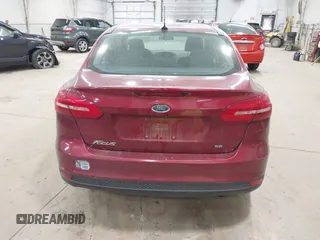 2015 Ford Focus SE with VIN 1FADP3F21FL270827, listed as a IAAI auction lot 42665015 with 162,745 mi miles and . Bid and sale history available at DreamBid. Image 17.