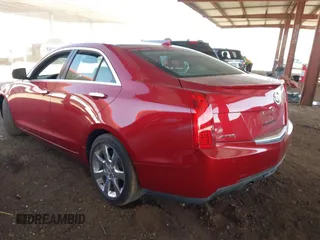 2013 Cadillac ATS Luxury with VIN 1G6AB5SX5D0145064, listed as a IAAI auction lot 41702363 with 34,031 mi miles and . Bid and sale history available at DreamBid. Image 3.