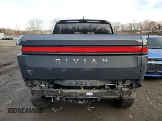 2023 Rivian R1T Adventure z VIN 7FCTGBAA8PN028065, wystawiony jako Copart lot #81941474 z przebiegiem 16 060 mil mil oraz Szkoda całkowita • Salvage title. Historia ofert i sprzedaży dostępna na DreamBid. Obrazek 6.