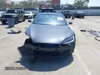 2016 Tesla Model S 90D with VIN 5YJSA1E22GF138236, listed as a IAAI auction lot 42532245 with 72,839 mi miles and . Bid and sale history available at DreamBid. Image 13.