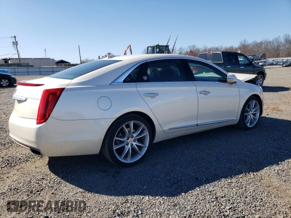 2013 Cadillac XTS Premium z VIN 2G61S5S34D9201773, wystawiony jako Copart lot #48572365 z przebiegiem 78 296 mil mil oraz Szkoda całkowita • Salvage title. Historia ofert i sprzedaży dostępna na DreamBid. Obrazek 3.
