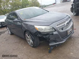 2013 Chevrolet Malibu LTZ with VIN 1G11H5SA1DF286288, listed as a IAAI auction lot 40457277 with 216,703 mi miles. Bid and sale history available at carsss.com. Image 1.