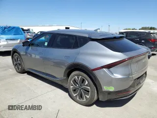 2022 Kia EV6 Wind with VIN KNDC3DLCXN5086669, listed as a Copart auction lot 68265344 with 74,711 mi miles and Salvage Title. Bid and sale history available at carsss.com. Image 2.