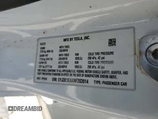 2022 Tesla Model 3 with VIN 5YJ3E1EAXNF203914, listed as a Copart auction lot 46982935 with 70,766 mi miles and Salvage Title. Bid and sale history available at DreamBid. Image 14.
