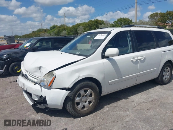2010 Kia Sedona LX with VIN KNDMG4C33A6338047, listed as a IAAI auction lot 42128485 with 99,498 mi miles and . Bid and sale history available at carsss.com. Image 18.