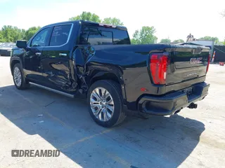 2021 GMC Sierra 1500 Denali with VIN 1GTU9FEL4MZ253708, listed as a IAAI auction lot 42209839 with 52,279 mi miles and . Bid and sale history available at DreamBid. Image 3.