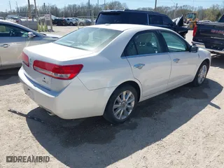 2011 Lincoln MKZ with VIN 3LNHL2GC2BR752903, listed as a IAAI auction lot 41758756 with 100,686 mi miles. Bid and sale history available at carsss.com. Image 4.