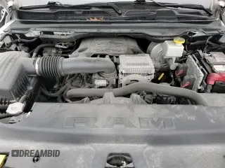 2019 Ram 1500 Longhorn z VIN 1C6SRFKT6KN700188, wystawiony jako Copart lot #57054115 z przebiegiem 119 193 mil mil oraz Czysty tytuł • Clean title. Historia ofert i sprzedaży dostępna na DreamBid. Obrazek 13.