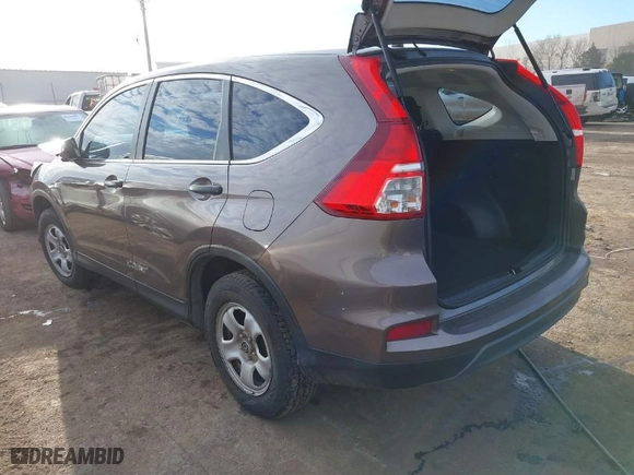 2015 Honda CR-V LX with VIN 3CZRM3H34FG707841, listed as a IAAI auction lot 41654996 with 133,894 mi miles. Bid and sale history available at carsss.com. Image 3.