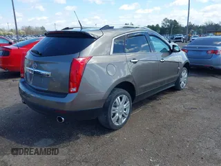 2011 Cadillac SRX Luxury Collection with VIN 3GYFNDEY6BS677576, listed as a IAAI auction lot 41769774 with 106,097 mi miles. Bid and sale history available at carsss.com. Image 4.
