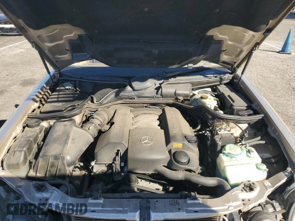 2000 Mercedes-Benz E-Class AWD with VIN WDBJF82G0YX029026, listed as a Copart auction lot 78106604 with 134,482 mi miles and Salvage Title. Bid and sale history available at carsss.com. Image 12.