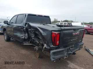 2021 GMC Sierra 1500 AT4 with VIN 1GTP9EED8MZ391803, listed as a IAAI auction lot 41275238 with 84,024 mi miles. Bid and sale history available at carsss.com. Image 6.