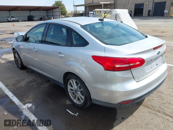 2015 Ford Focus SE with VIN 1FADP3F24FL203509, listed as a IAAI auction lot 41765582 with 139,856 mi miles. Bid and sale history available at carsss.com. Image 3.