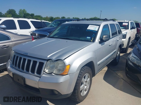 2010 Jeep Grand Cherokee Laredo with VIN 1J4PR4GK1AC143780, listed as a IAAI auction lot 42058575 with 88,608 mi miles. Bid and sale history available at carsss.com. Image 2.