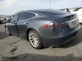 2016 Tesla Model S 90D with VIN 5YJSA1E2XGF156161, listed as a Copart auction lot 52332685 with 47,893 mi miles and Salvage Title. Bid and sale history available at carsss.com. Image 2.