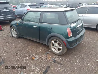 2006 MINI Hardtop with VIN WMWRC33506TK73564, listed as a IAAI auction lot 42602486 with 156,459 mi miles and . Bid and sale history available at DreamBid. Image 3.
