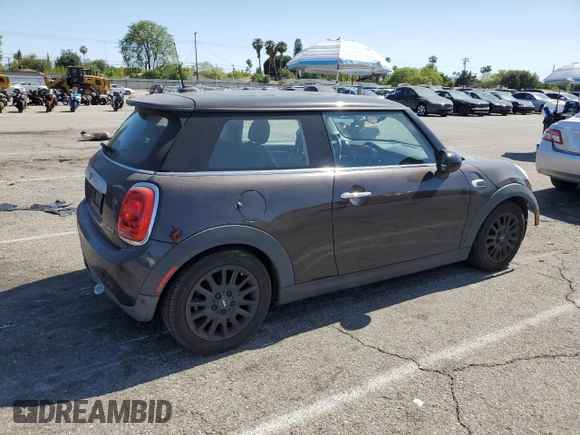 2014 MINI Hardtop with VIN WMWXM5C57ET934120, listed as a Copart auction lot 58594845 with 115,248 mi miles and Salvage title. Bid and sale history available at DreamBid. Image 3.