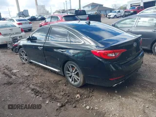 2015 Hyundai Sonata 2.0T Sport with VIN 5NPE34AB2FH068154, listed as a IAAI auction lot 42085654 with 77,824 mi miles. Bid and sale history available at carsss.com. Image 3.